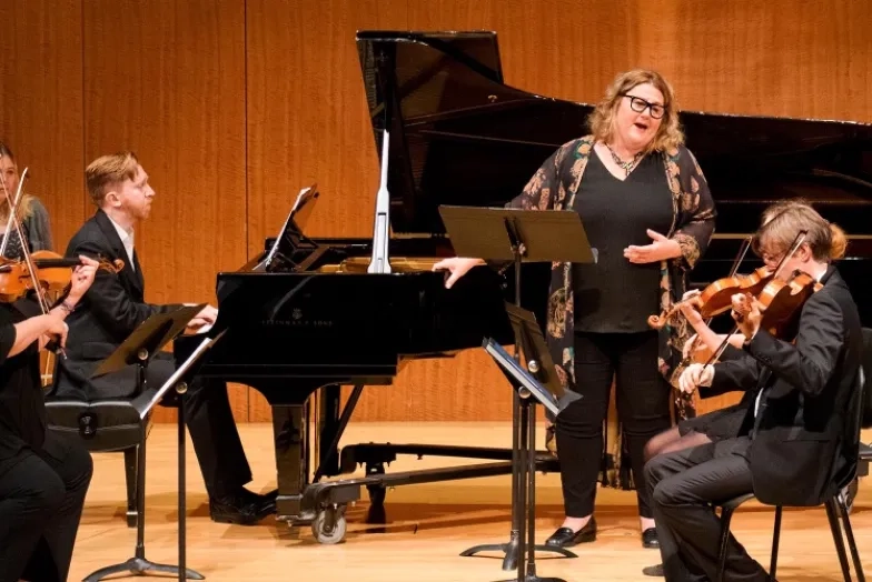 A photo of musicians performing