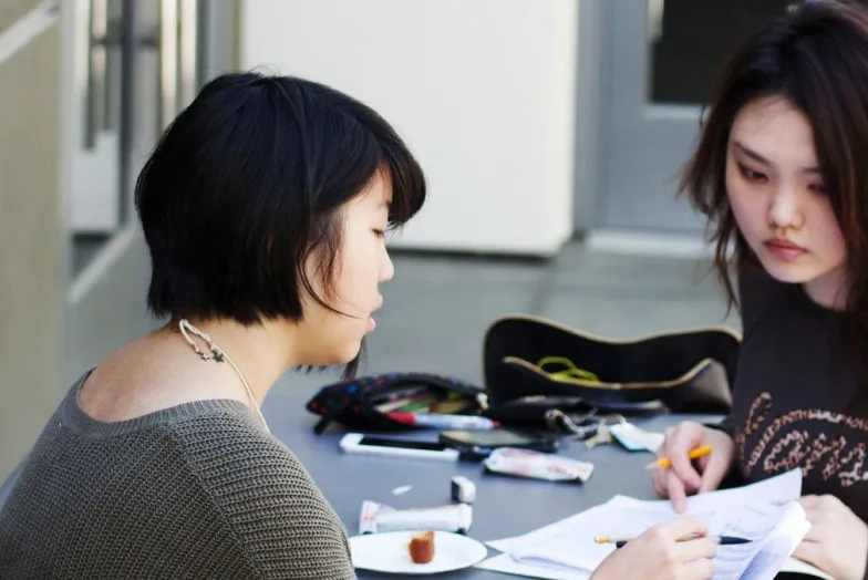 Conservatory students studing on the sixth floor terrace