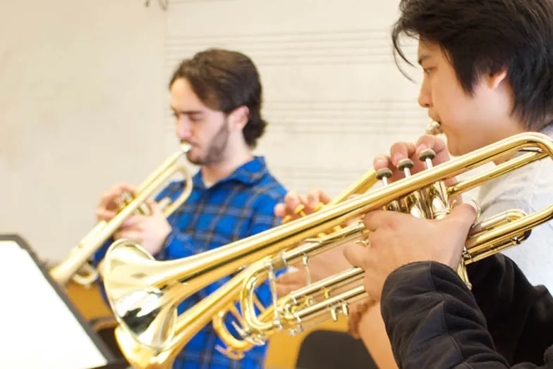 Brass chamber group playing for a coach