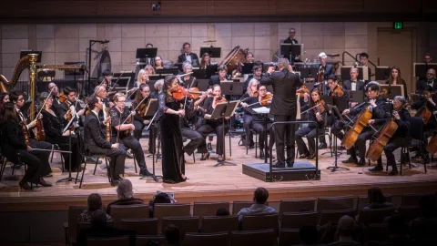 Strings perform with orchestra