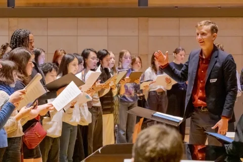 Chanticleer's Tim Keeler works with students.