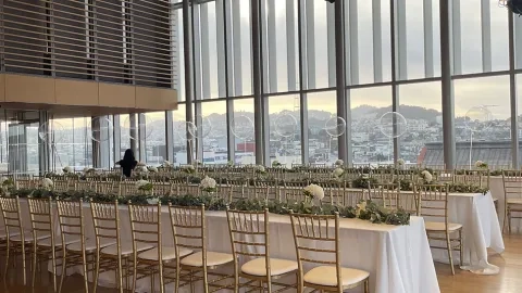Osher Hall with log tables for dinner